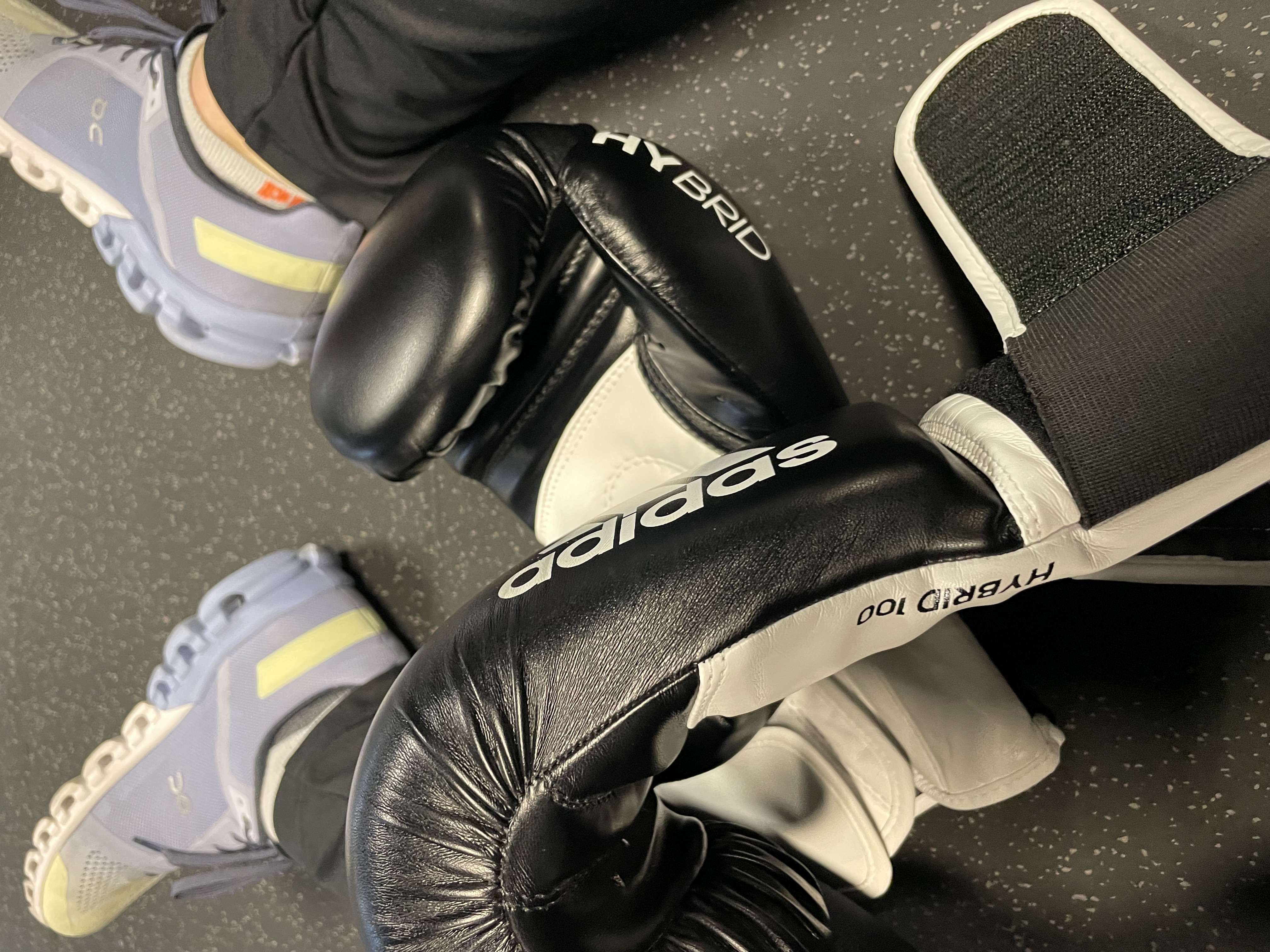 Boxing gloves and training shoes ready for a session